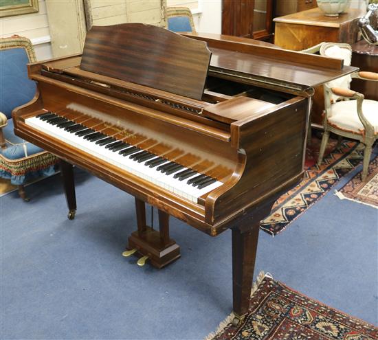 A Monnington and Weston mahogany cased Baby grand piano W.144cm